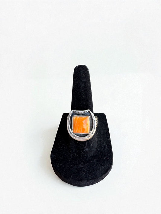 Orange spiny horseshoe ring